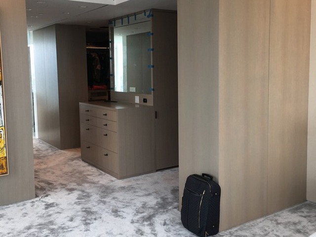 Penthouse apartment master closet and wine room installation 